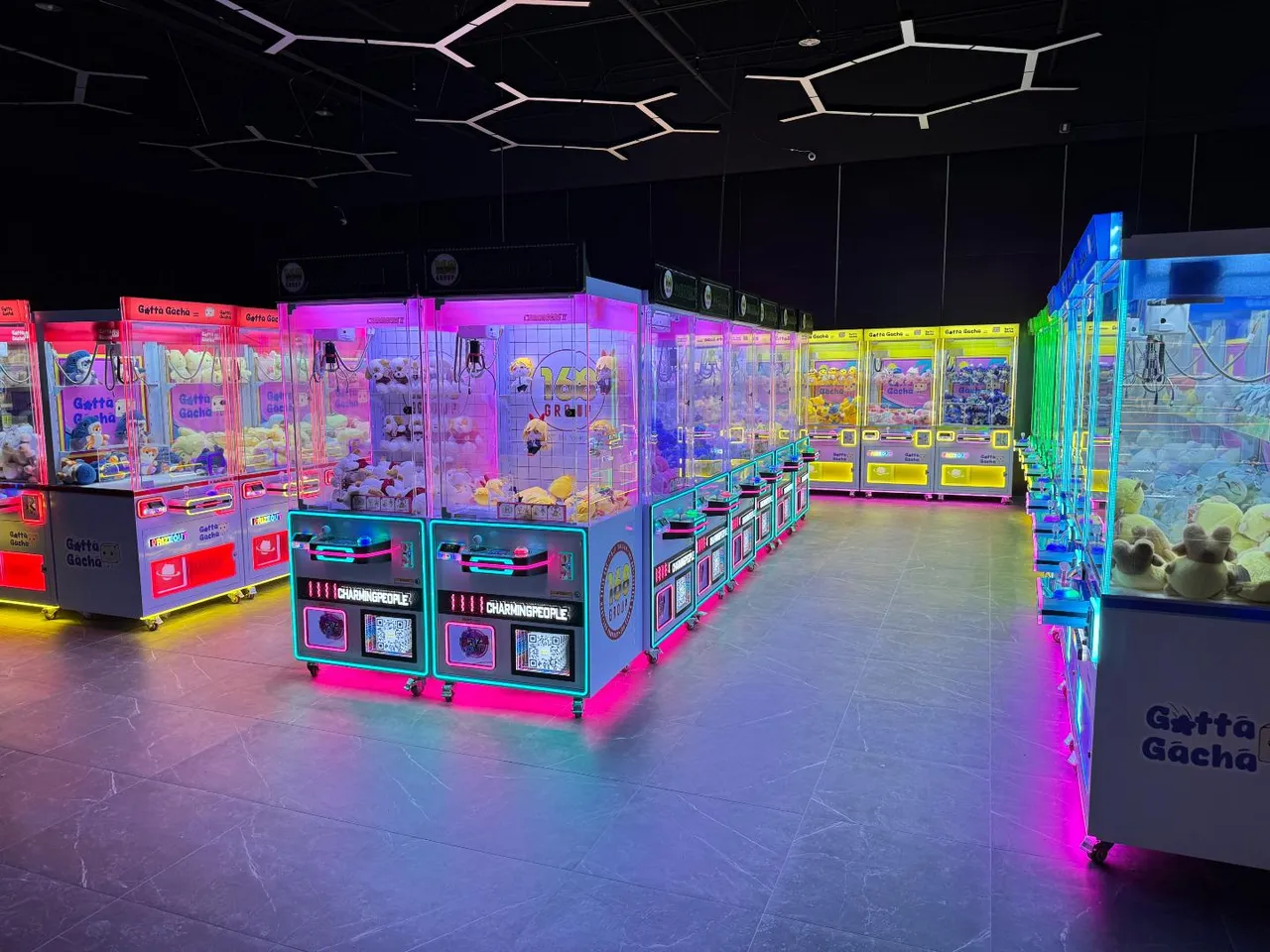 The colorful claw machine floor at GottaGacha